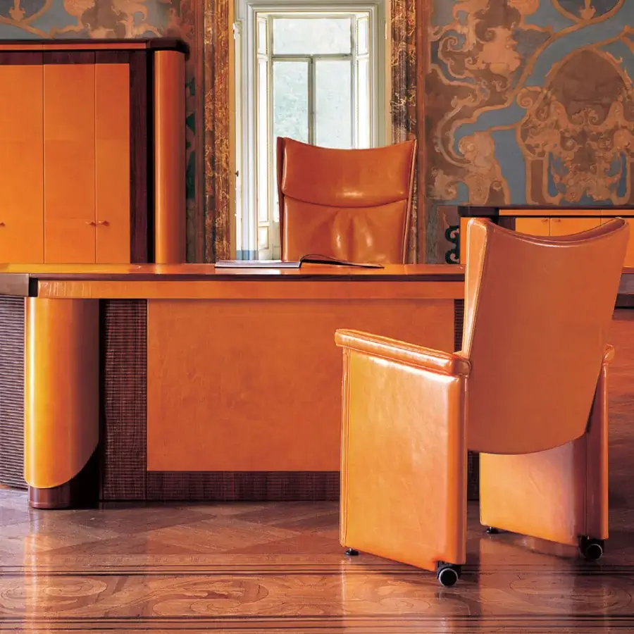Superior Mascheroni Planet V armchair with smooth orange leather upholstery and birch wood structure built with black castors