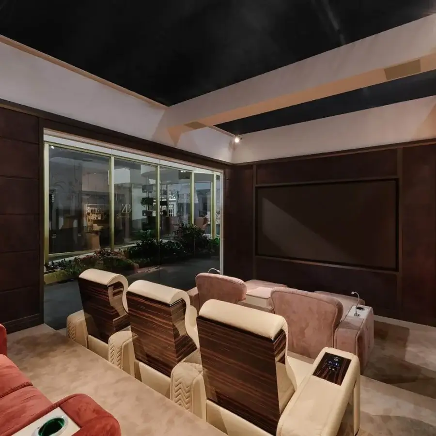 Distinguished Vismara Onassis Home Cinema seating crafted in light beige fine-grained leather with polished Ebony Makassar accents