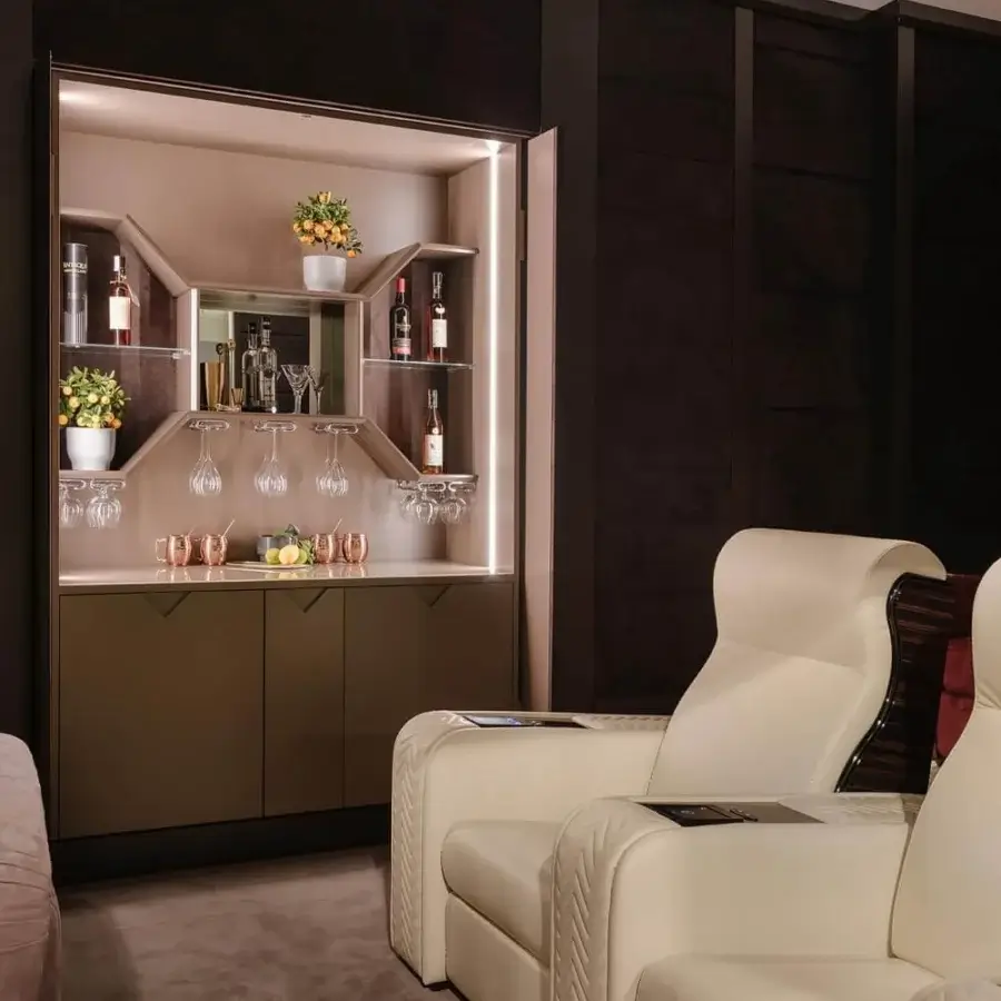 Lavish Vismara Onassis Home Cinema seating in Coconut Milk fine-grained leather with polished Ebony Makassar details