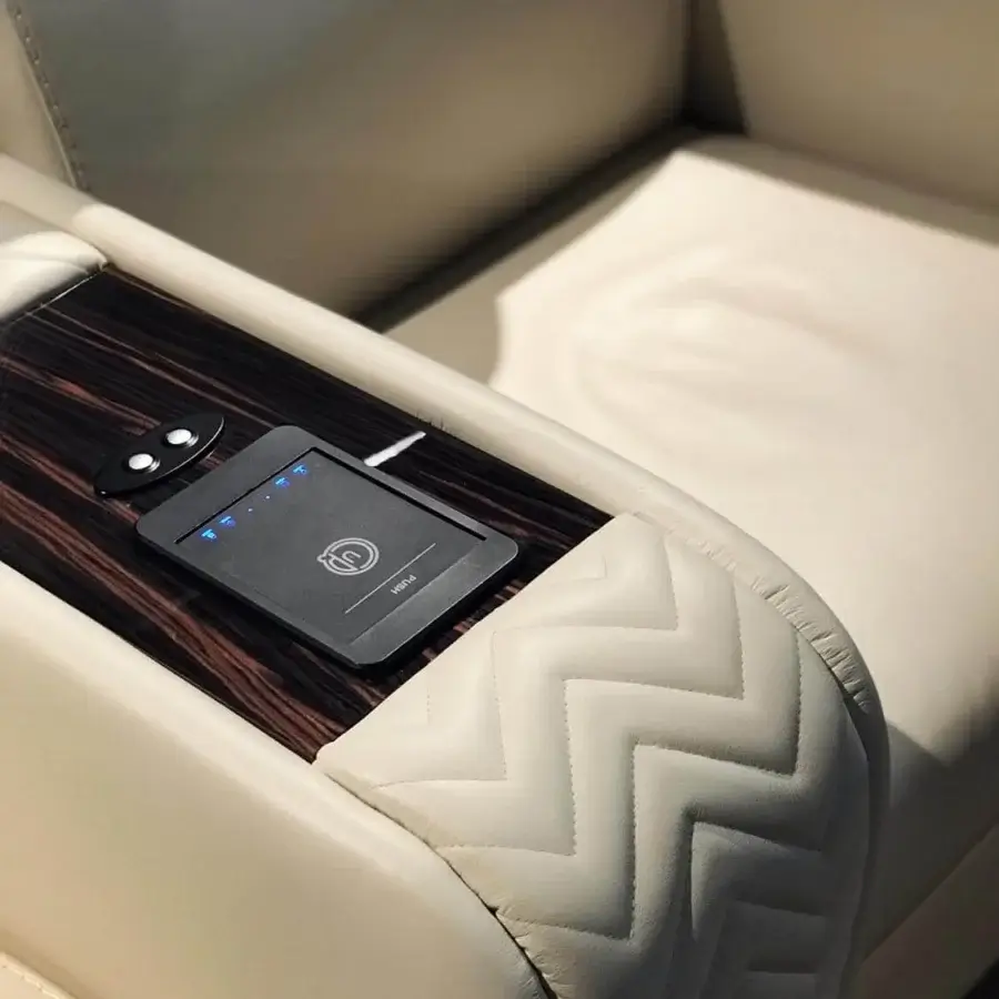 Distinguished Vismara Onassis Home Cinema seating crafted in Coconut Milk fine-grained leather with geometric quilted armrests and polished Ebony Makassar