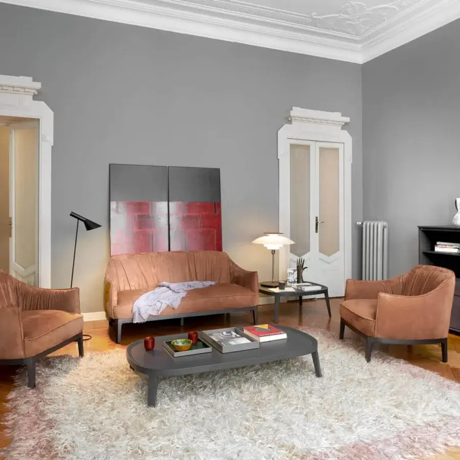 Distinguished Potocco Blossom sofa with curved silhouette upholstered in muted dusty rose textile and square ash wood base