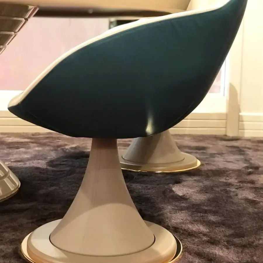 Lavish Vismara Shell armchair built in dark teal Top Grain leather with light beige Eco Nabuk interior and gold metal detailing