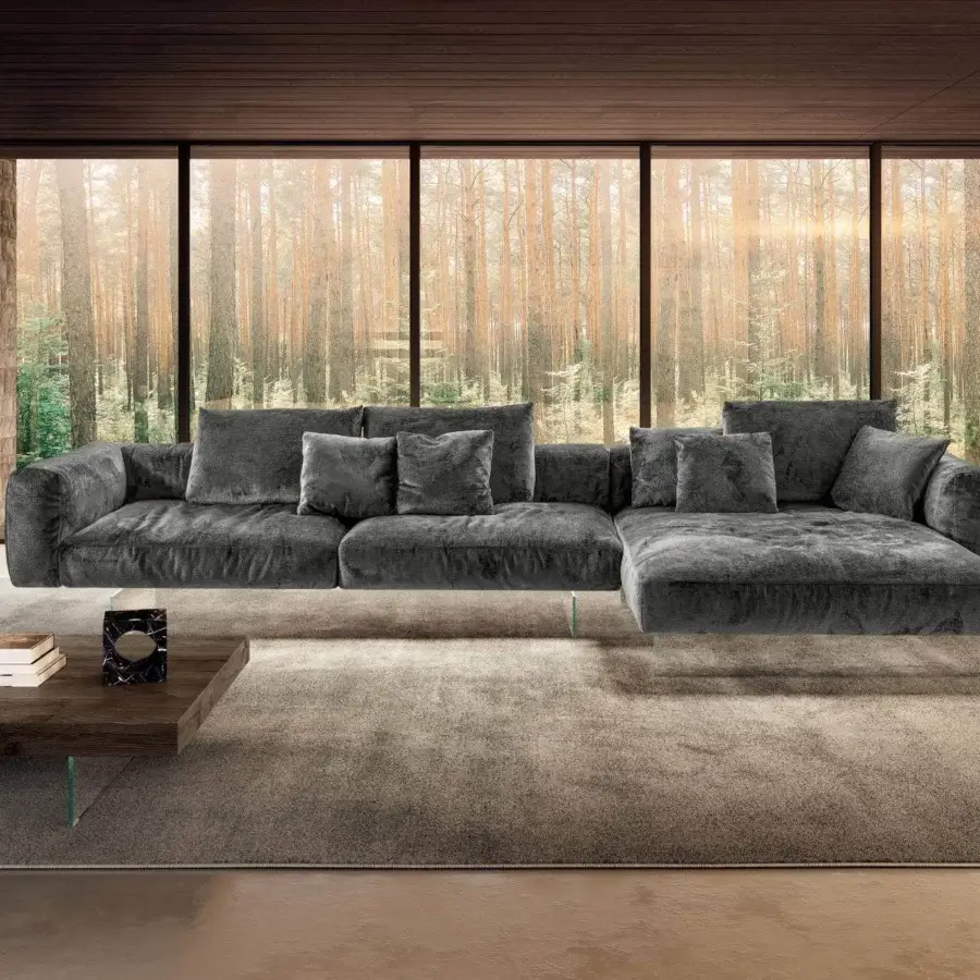 Innovative Lago Air Soft sectional with dark gray textile and transparent tempered glass legs appears to float