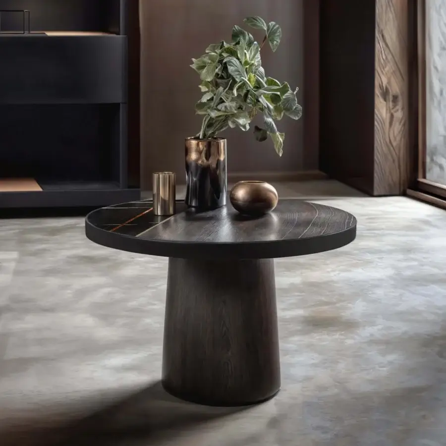Side table, dark wood, circular tabletop with orange inlay, paired with bronze vase and ceramic vessel in a minimalist gray interior.