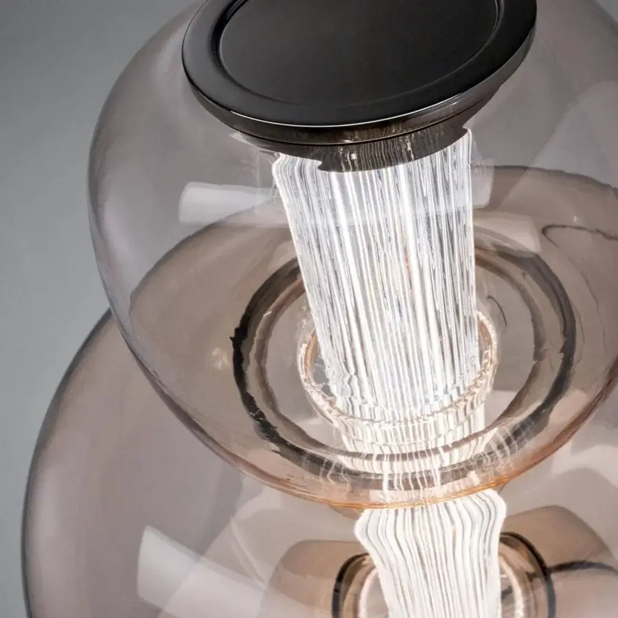 Exceptional Italamp Nube lamp crafted in glossy glass with an iron grey metal finish and hand-carved crystal diffuser