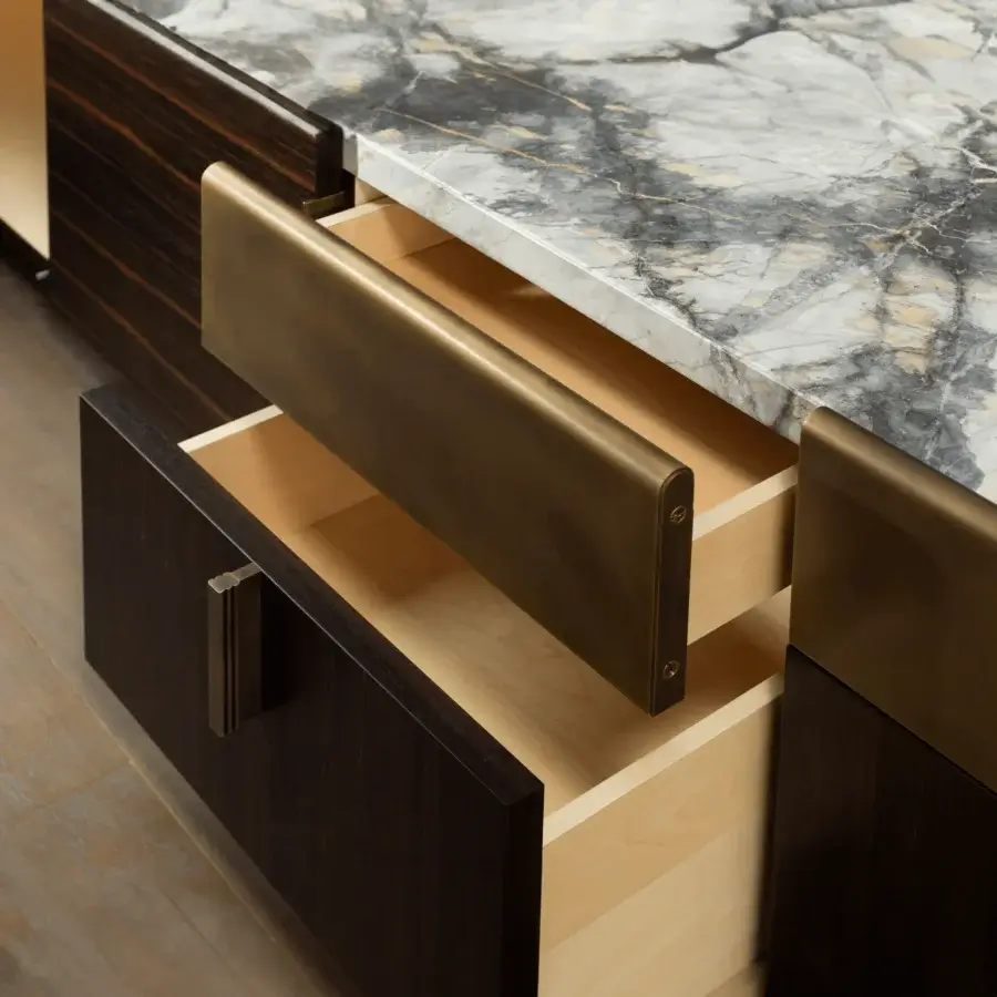 Distinguished Bellavista Milano sideboard crafted in dark-stained wood with a light gray marble top and bronze handles, revealing natural maple interiors