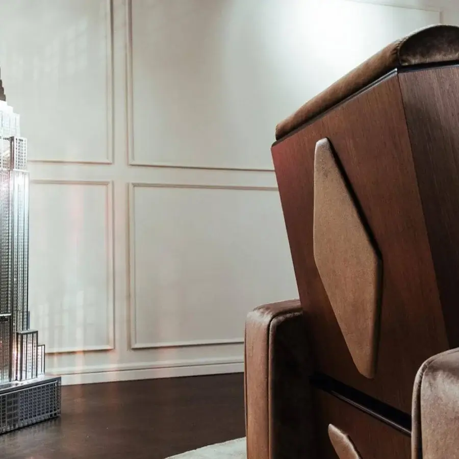 Elegant Vismara Luxor home cinema seating with medium-brown lacquered wood and plush dark textile cushions