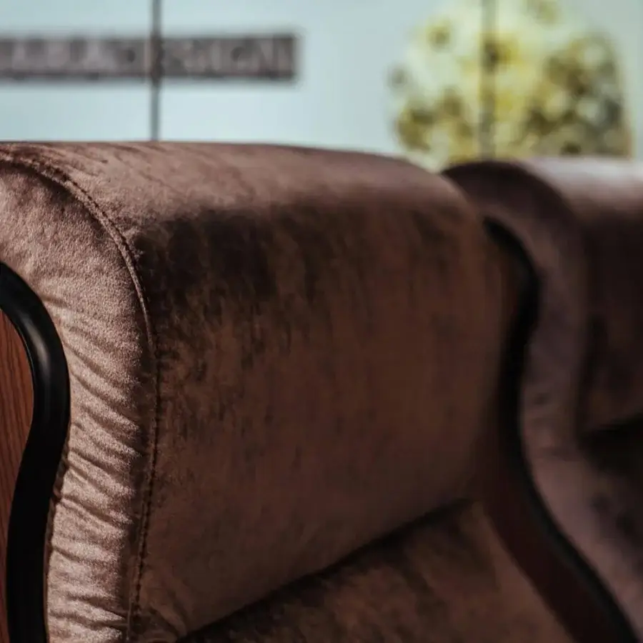 Superior Vismara Luxor home cinema seating with warm brown textile upholstery and glossy lacquered wood armrests
