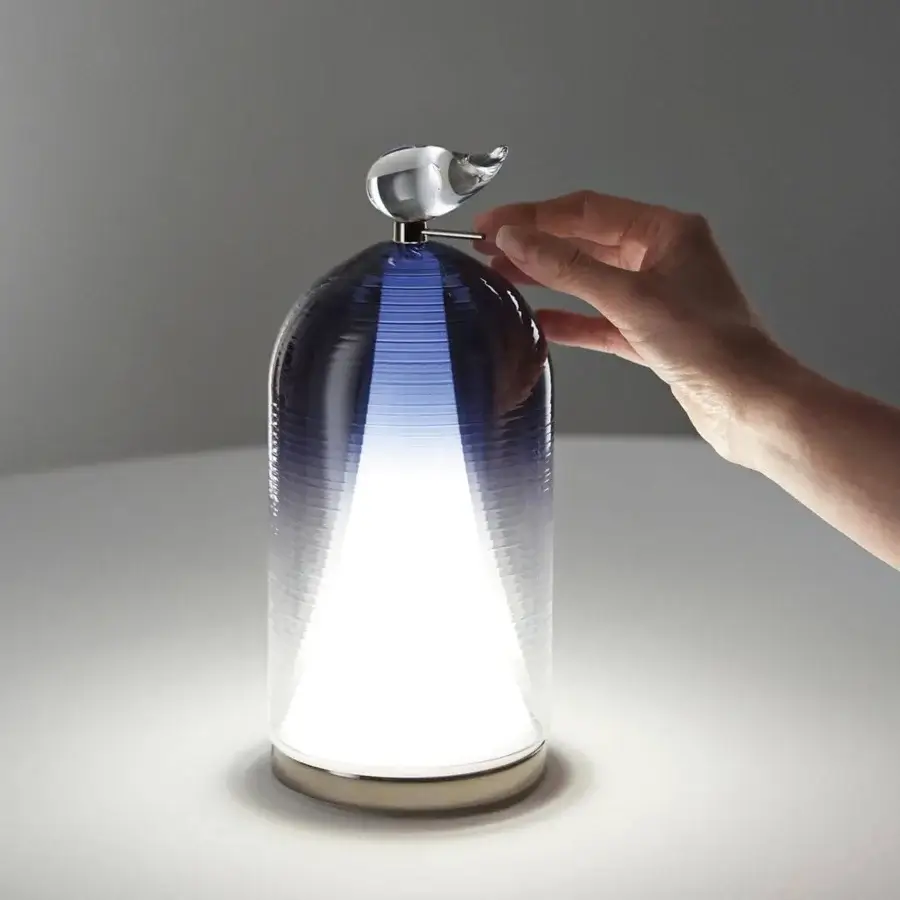 Distinguished Italamp Munetta table lamp with blue shaded blown glass and white internal diffuser crafted in iron grey metal