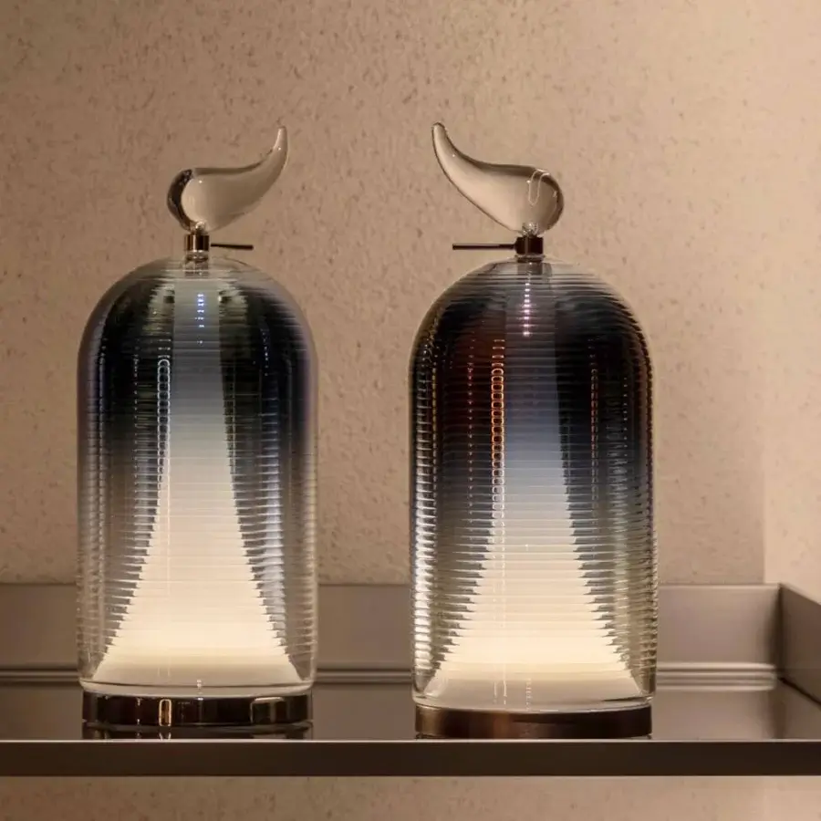 Superior Italamp Munetta table lamp with shaped blown glass in a blue shade and iron grey metal structure