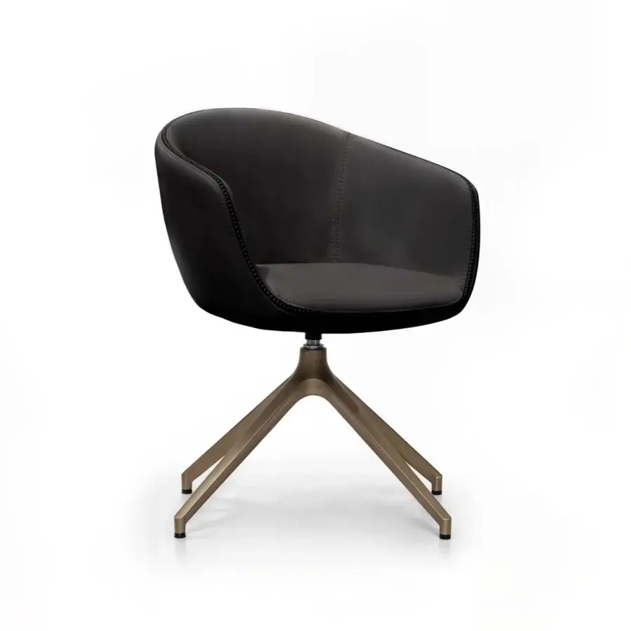 Distinguished WAYNE Enterprises WE-136 armchair with dark upholstery and sleek golden-bronze metal base crafted in Italy