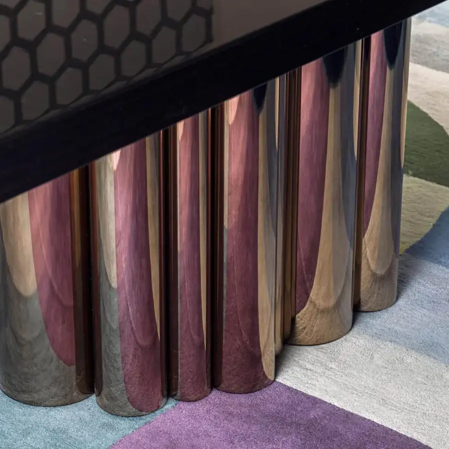 Elegant Costantini Pietro Splendor table with dark glossy rectangular top and unique cylindrical legs in reflective pinkish-brown tone
