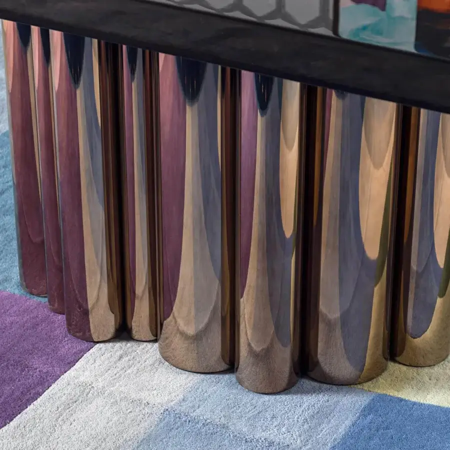 Captivating Costantini Pietro Splendor table with dark rectangular top and cylindrical base displaying gradient bronze, rose, and purple hues