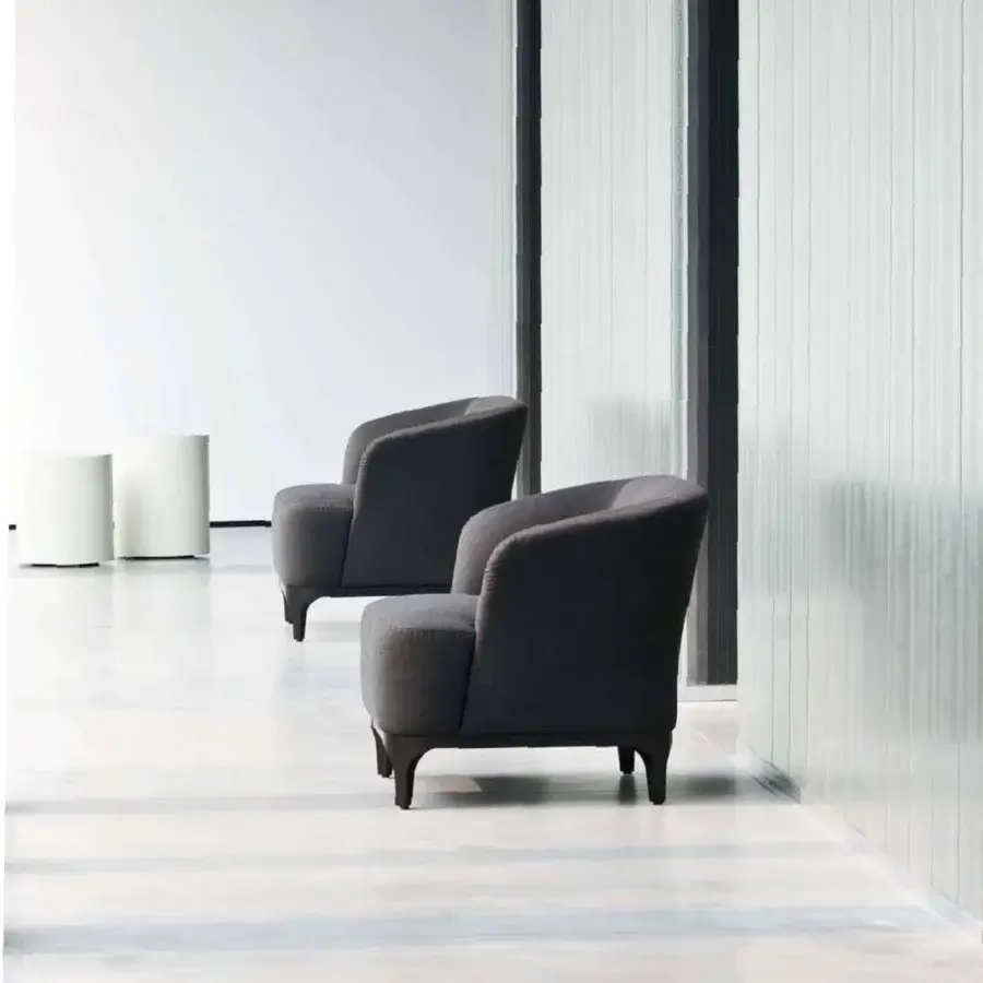 Elegant LaCividina Elle lounge chair with dark gray textile upholstery and black painted wood surround