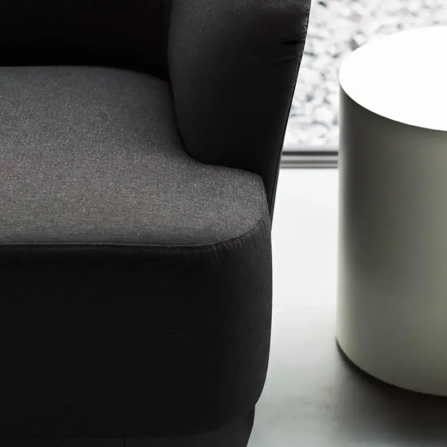 Elegant LaCividina Elle lounge chair with dark gray textile upholstery and black painted wood legs