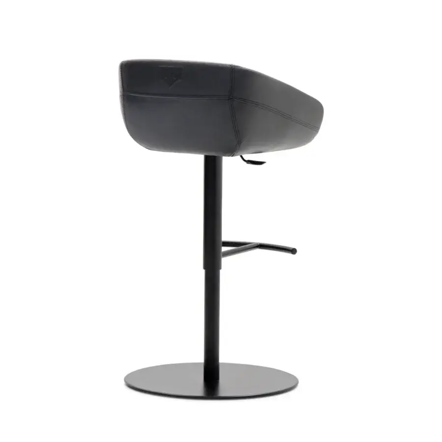 Exclusive WAYNE Enterprises WE-140 bar stool crafted in premium leather with a matte black metal base and iconic logo embossing