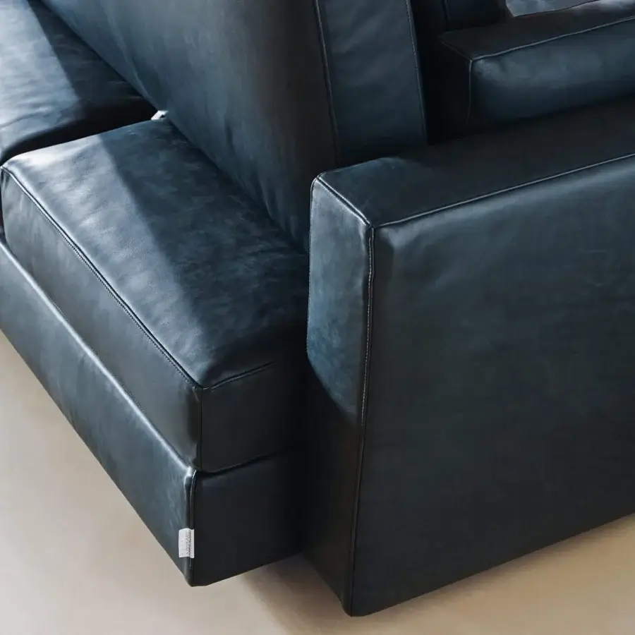 Distinguished Swan Italia Hemingway sofa with completely removable black leather upholstery and powder-coated metal feet