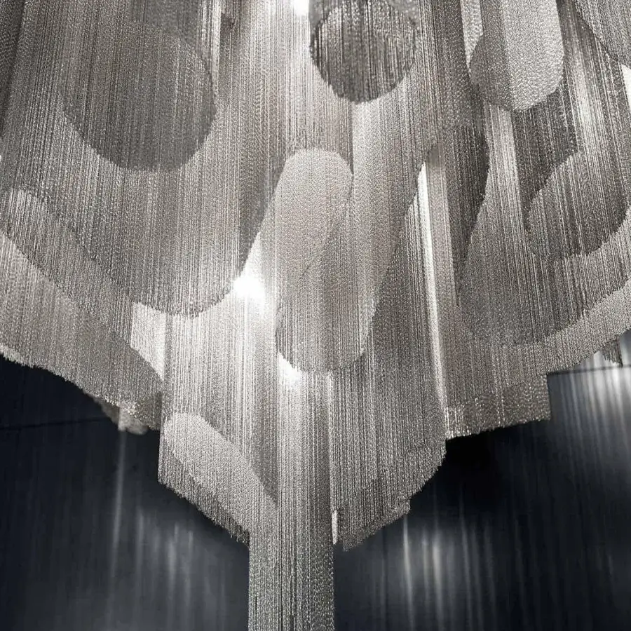 Distinguished Terzani Stream ceiling lamp with flowing metal chains and a light-reflective silver finish creating cascading tiers