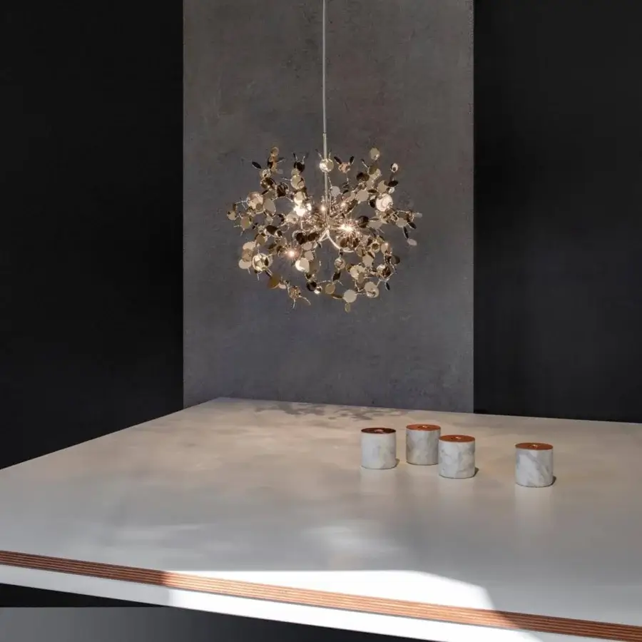 Distinguished Terzani Argent suspension lamp crafted with joined metal discs in a glossy gold or brass tone finish
