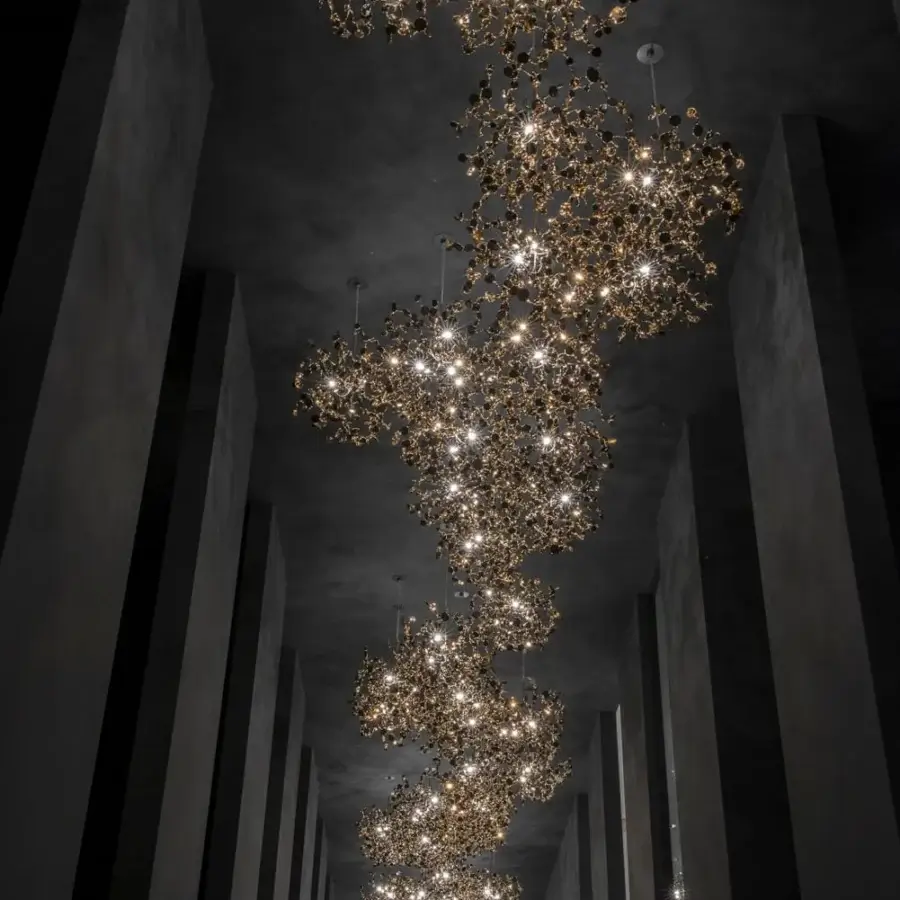 Exceptional Terzani Argent suspension lamp crafted in Italy with arranged reflective metal and warm gold finish