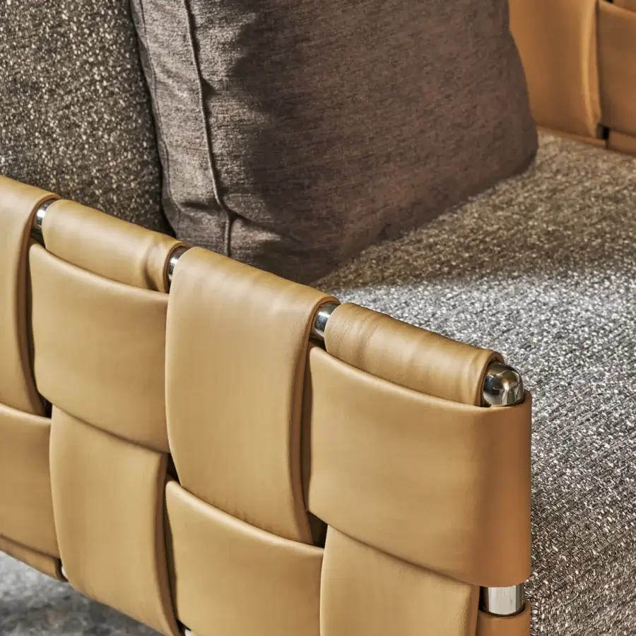 Distinguished Turri Ratio lounge chair with woven light tan leather and mottled grey brown textile cushions