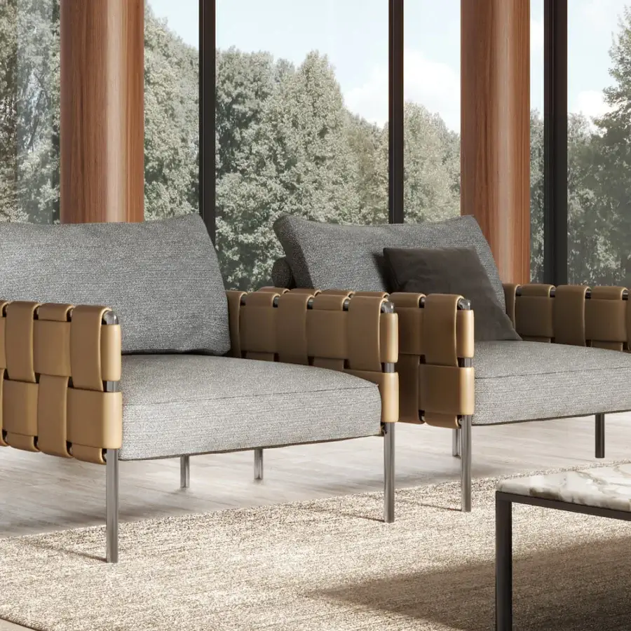 Superior Turri Ratio lounge chair with tan woven leather and generous gray textile cushions in matte silver finish