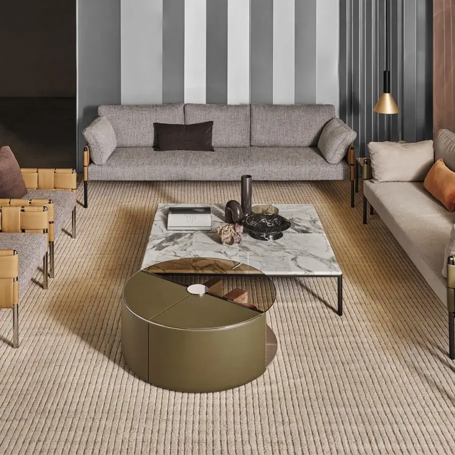 Exceptional Turri Ratio lounge chair with woven light tan leather and comfortable gray textile cushions built with a sleek metal frame