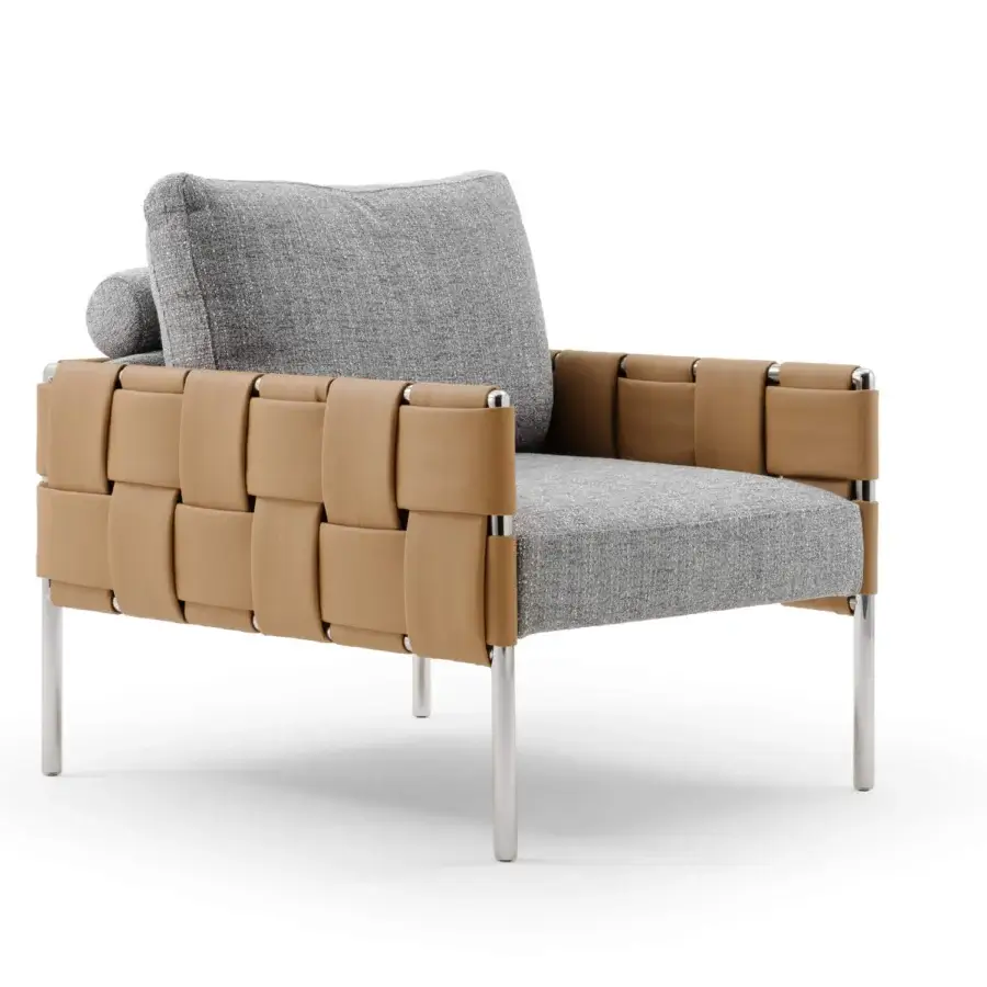 Distinguished Turri Ratio lounge chair with textured gray textile cushions and woven tan leather straps, built with a sleek metal structure