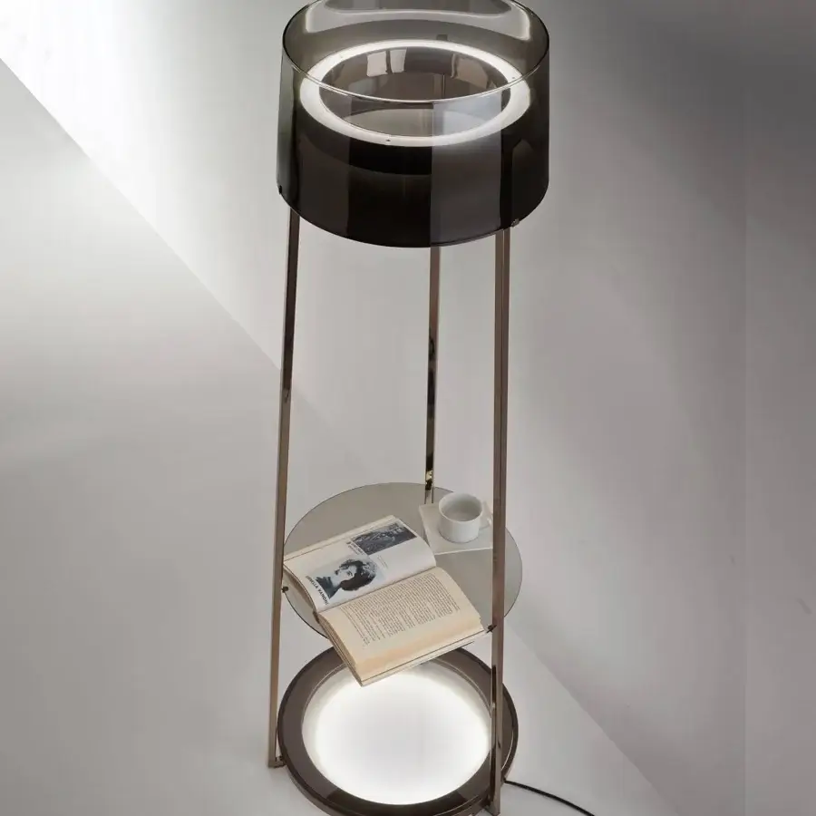 Elegant Italamp Antea floor lamp with titanium shaded blown glass and iron grey metal structure including a smoked glass shelf