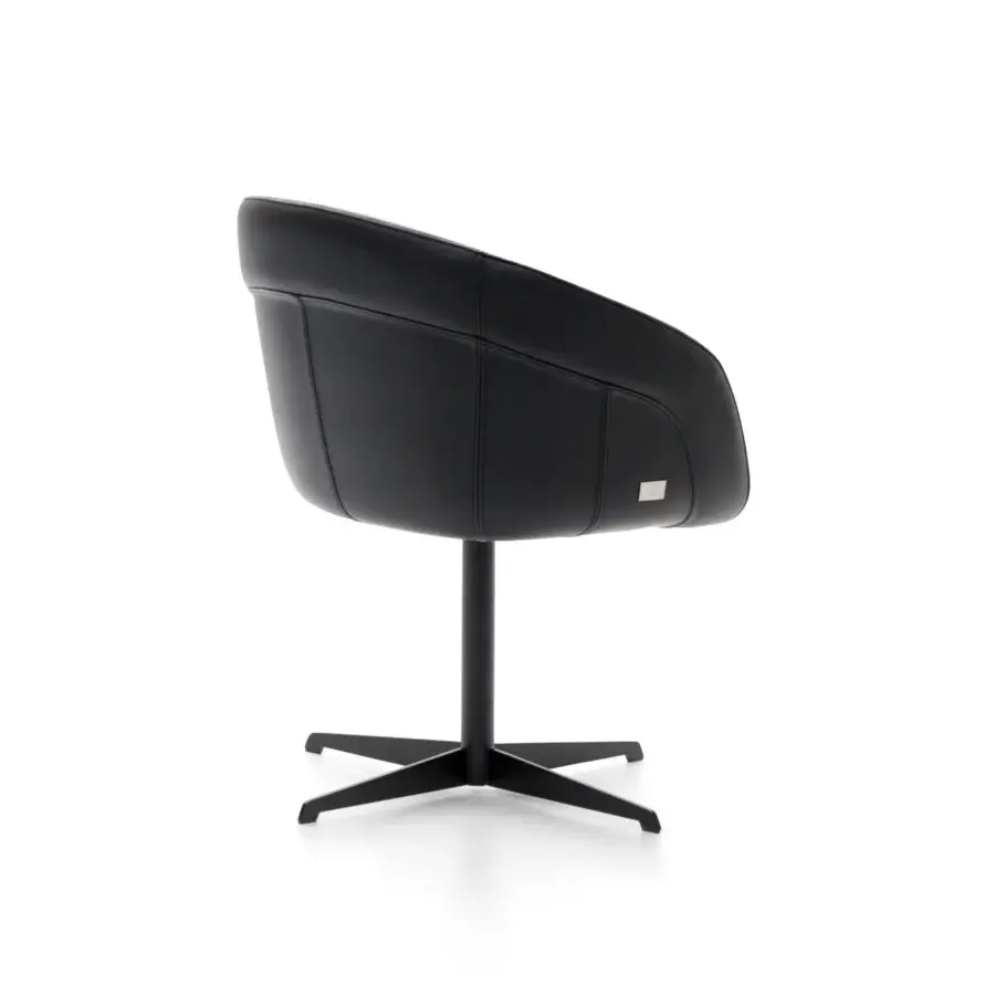 Distinguished Wayne Enterprises WE-137 armchair upholstered in luxurious black leather with a sleek metal swivel base