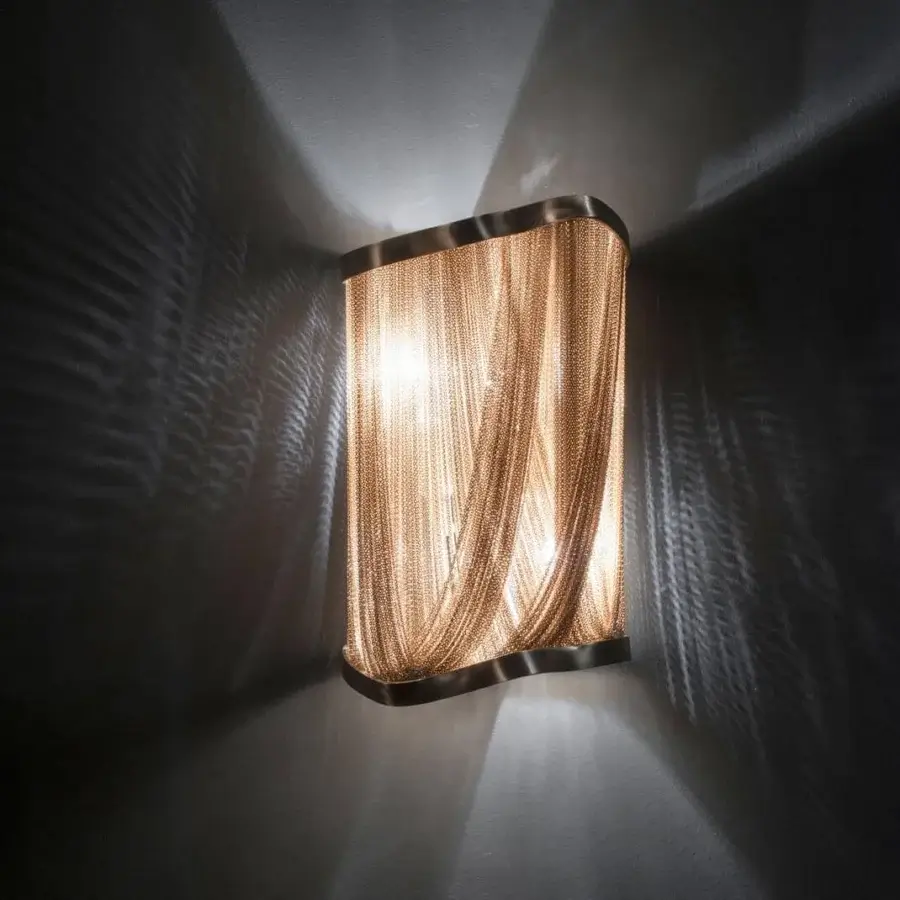 Distinguished Terzani Atlantis wall lamp with hundreds illuminated brass chains and a brushed metal frame crafted in Italy