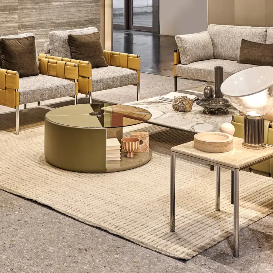 Distinguished Turri Ratio side table with silver-toned metal supporting a light marble top and square patchwork design