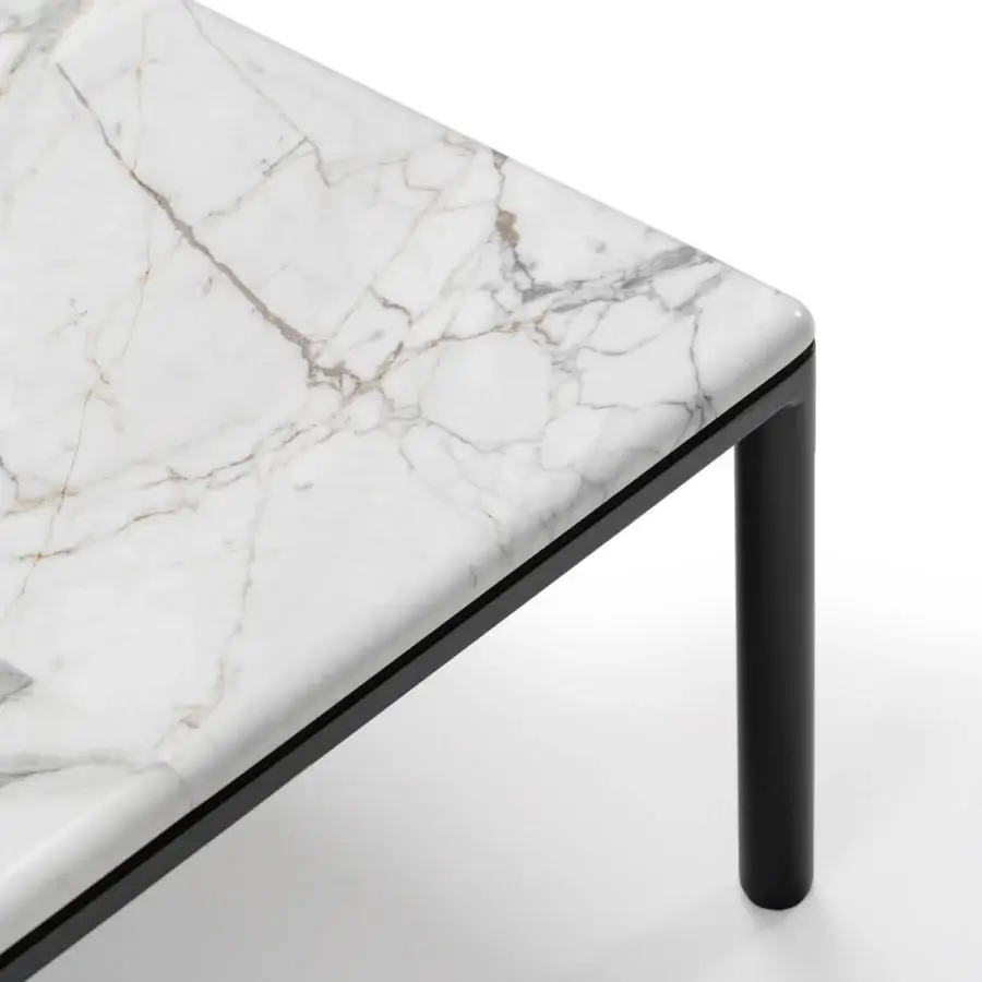 Elegant Turri Ratio coffee table with a black metal structure and white marble displaying gold veining in patchwork squares