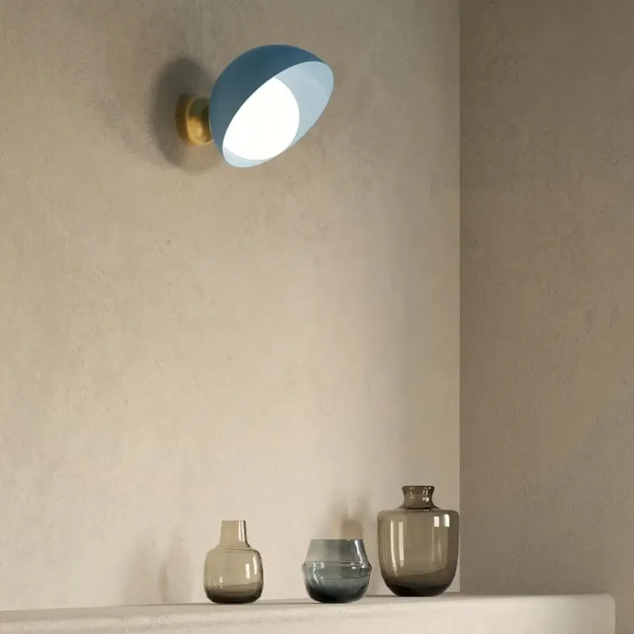 Distinguished Italamp Aurora wall lamp with a brushed light gold metal support and spherical white glass diffuser in matte blue