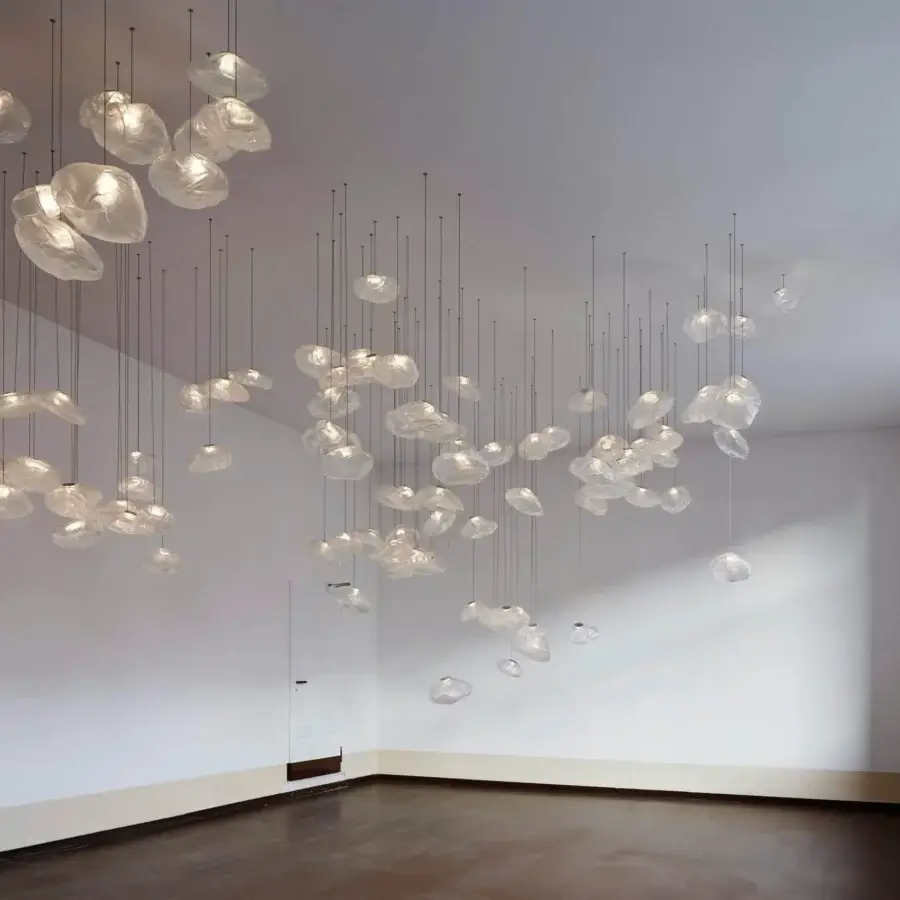 Distinguished Bocci 73 suspension lamp crafted in translucent white hand-blown glass presenting a captivating cloud-like composition