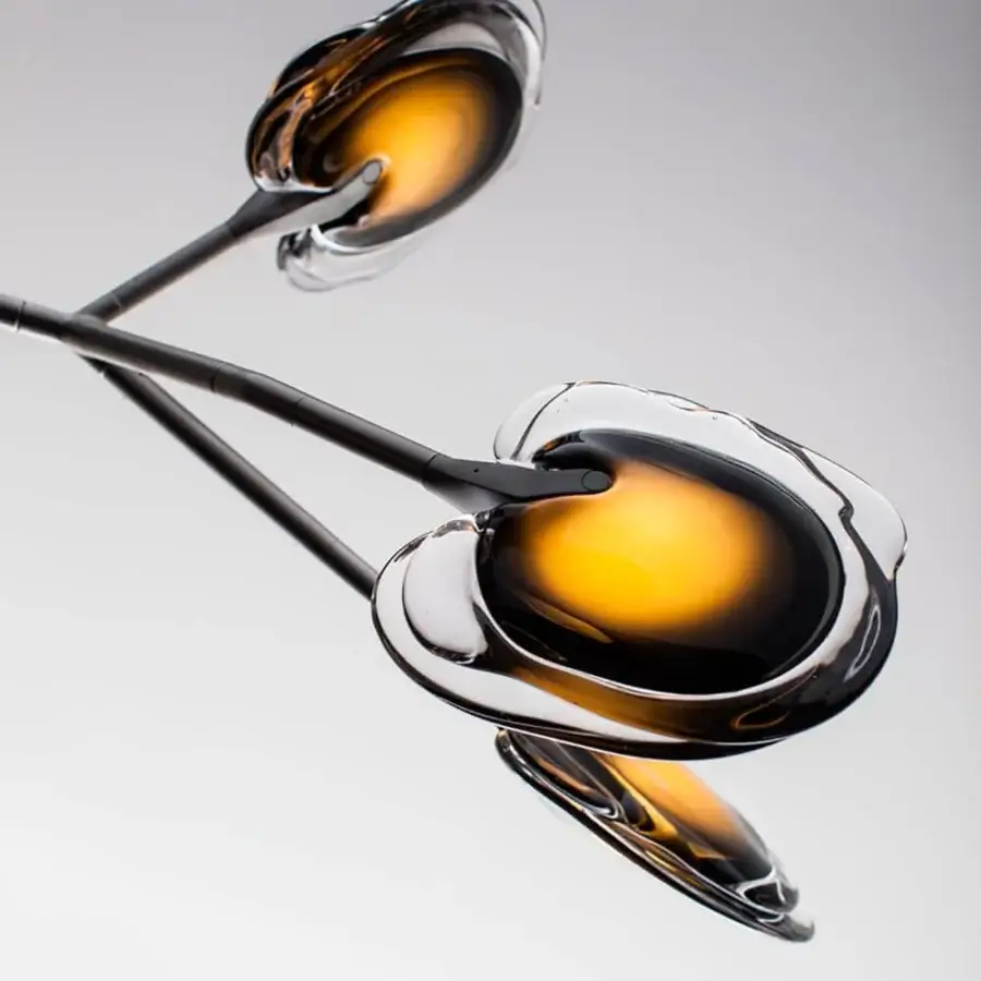 Exclusive Bocci 16 Tree floor lamp with luminous layered glass shades transitioning to warm amber tones within slender intersecting stems