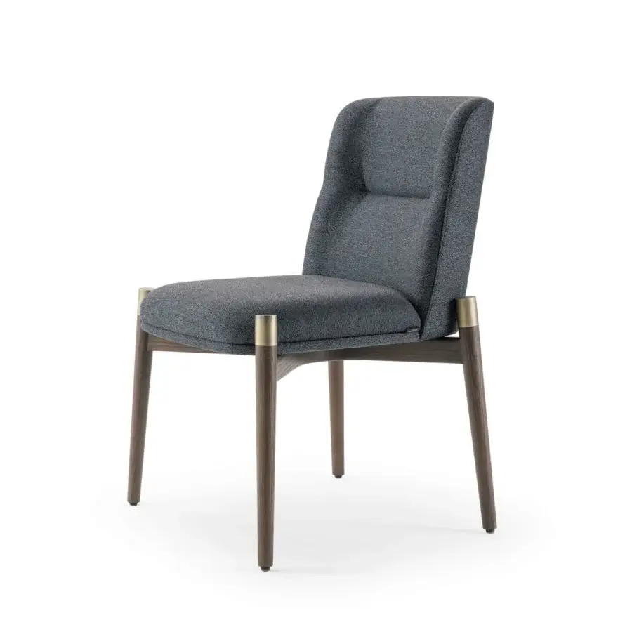 Lavish Turri Atelier chair with walnut wood, brass details and mottled gray textile upholstery for relaxing comfort
