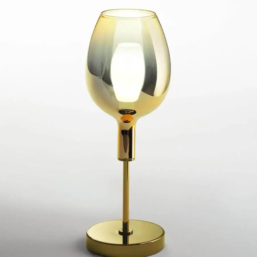 Distinguished Italamp Rosè table lamp with elongated glass diffuser and refined golden metal structure built with a USB power cable