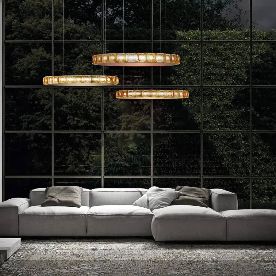 Captivating Italamp Aura suspension lamp with metal rings in satin gold and amber krek glass diffusers crafted with delicate cables