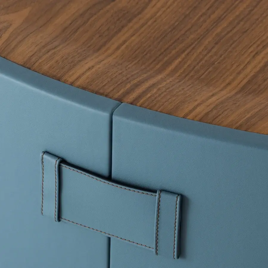 Distinguished Turri Atelier coffee table with a walnut wood top and light blue leather cylindrical base crafted with stitched buckle detail