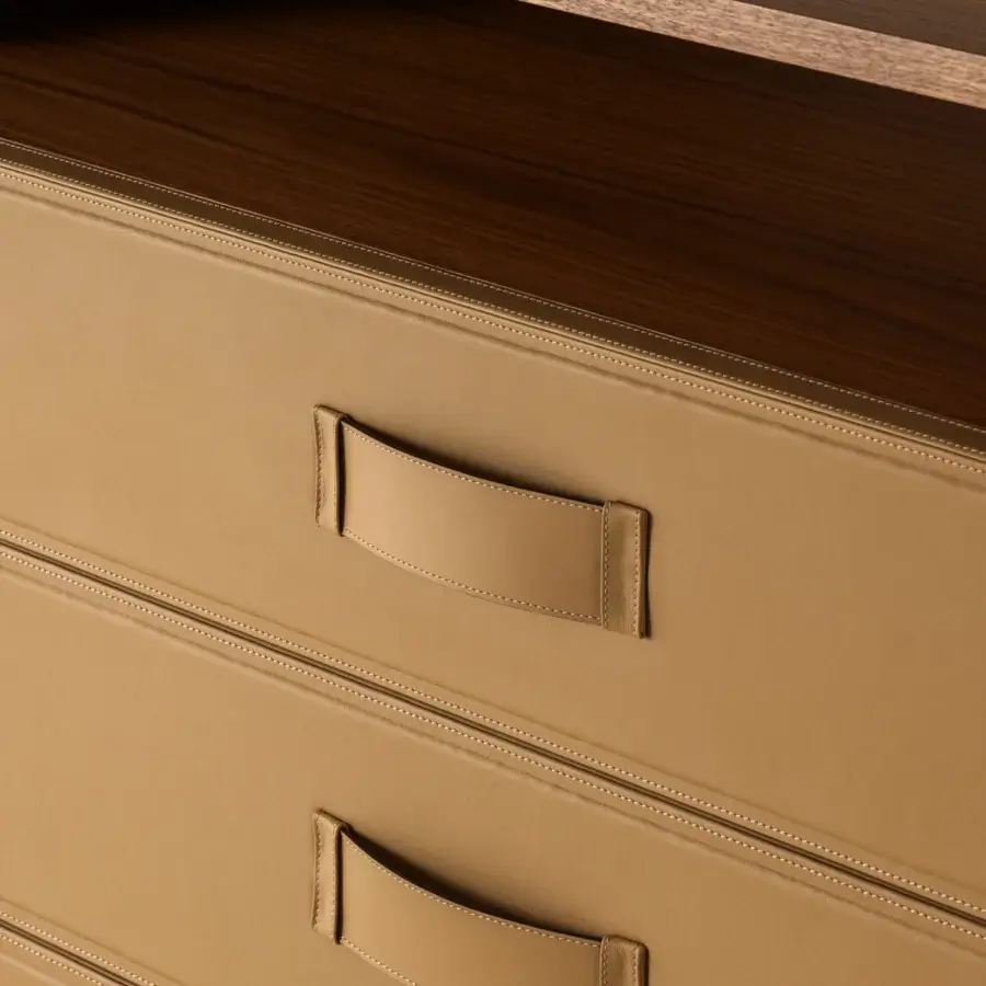 Distinguished Turri Atelier dresser crafted in walnut wood with tan leather covering and looped handles