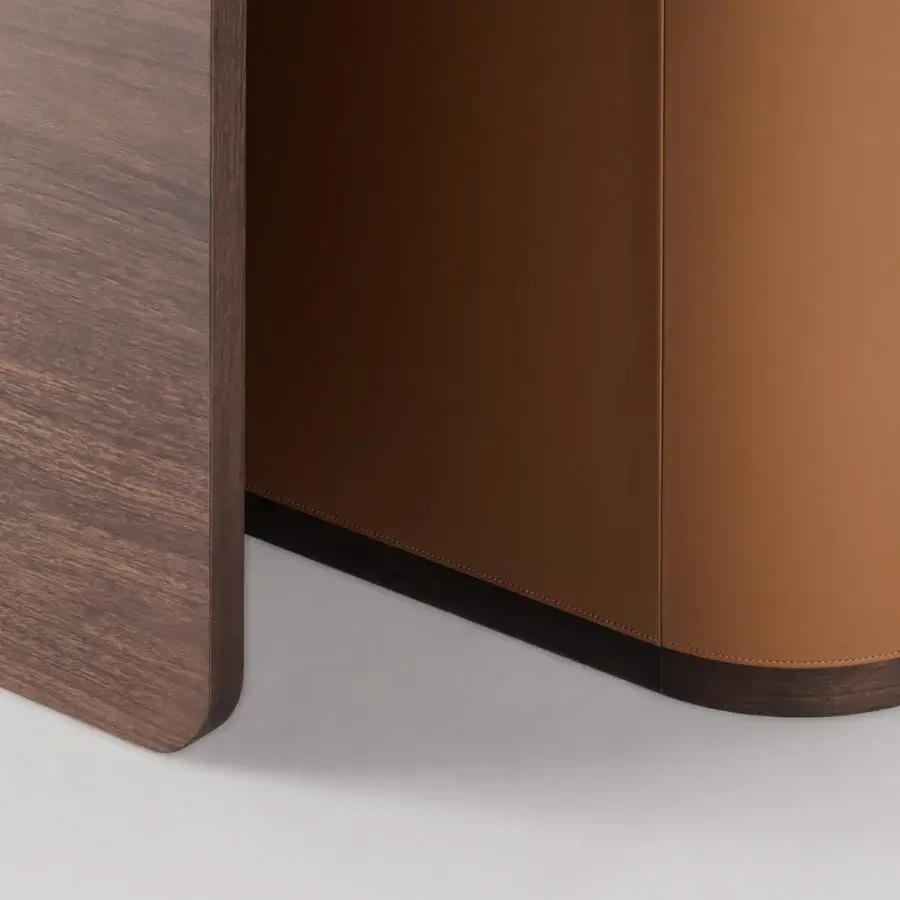 Captivating Turri Echo table crafted in walnut wood with a distinctive base partially covered in tan leather