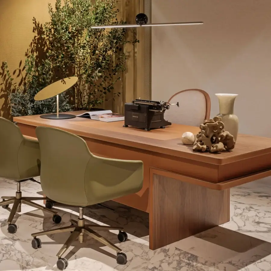 Elegant Turri Echo desk with light-toned walnut wood top, darker wood base and recessed leather-lined drawers with matte finish