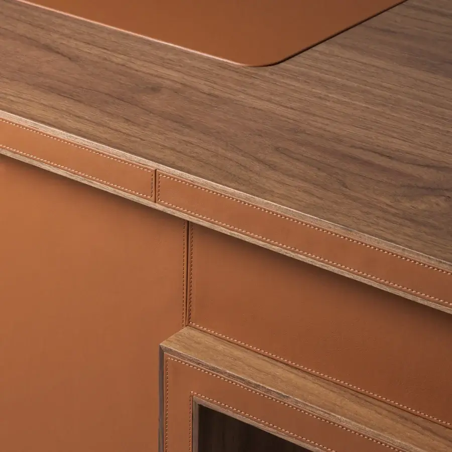 Superior Turri Echo desk with walnut wood top and brown leather-like material, crafted with delicate stitching and leather-lined drawers