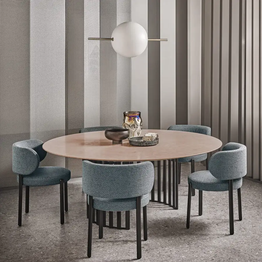 Distinguished Turri Roma table with a pinkish-tan composite tabletop and dark metal geometric base crafted with a glossy lacquered finish