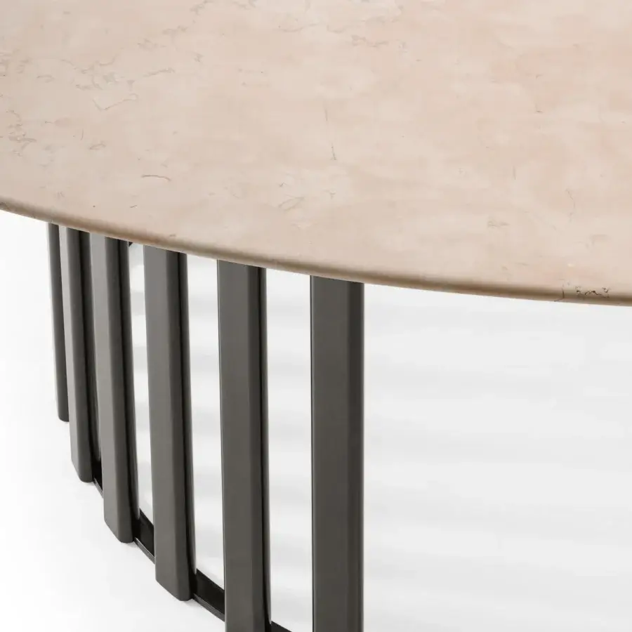 Distinguished Turri Roma table with a beige marble-like top and dark gray metal tube base exhibiting a polished finish