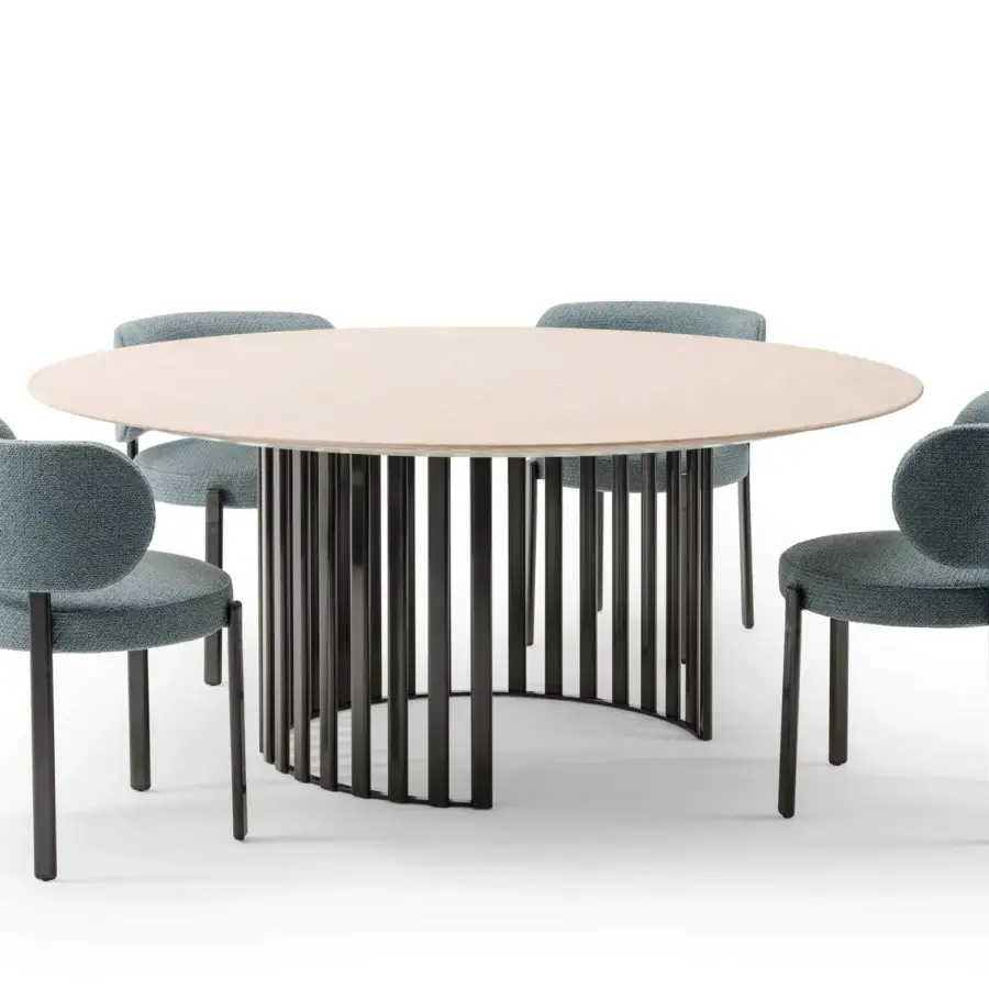 Distinctive Turri Roma table with a glossy lacquered circular tabletop and vertical metal tube base built with textured blue-grey textile chairs
