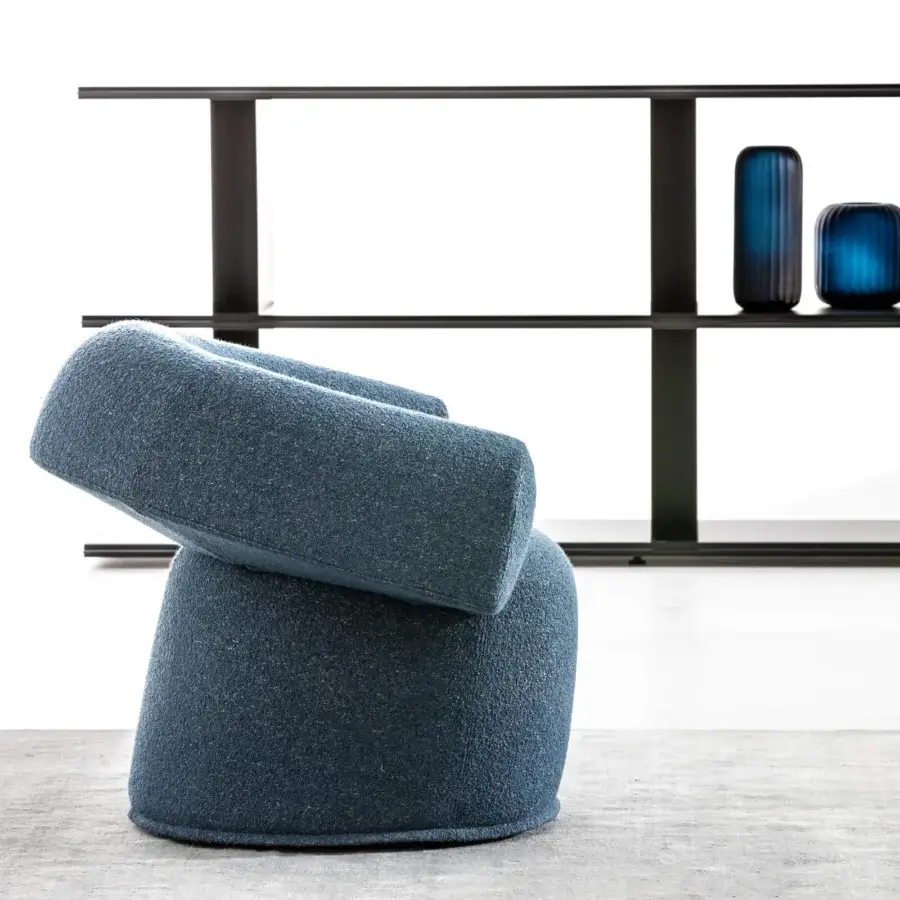Exceptional Moroso Ruff lounge chair with rounded form upholstered in coarse dark blue textile crafted in Italy