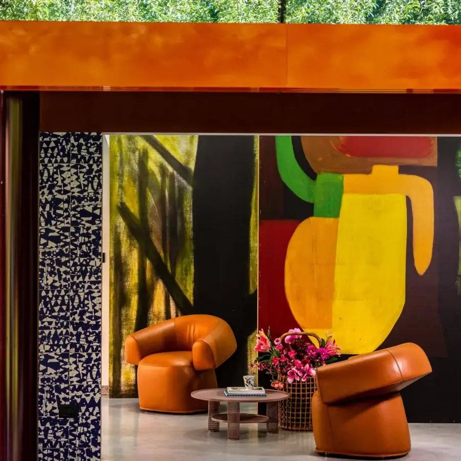 Superior Moroso Ruff lounge chair with smooth orange-brown upholstery and a hidden base crafted in Italy