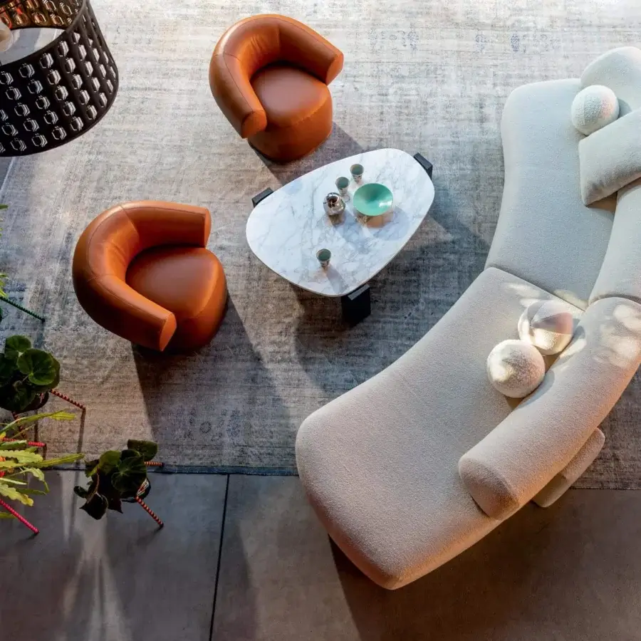 Distinguished Moroso Ruff lounge chair with smooth tan upholstery and transparent PVC glides crafted in Italy